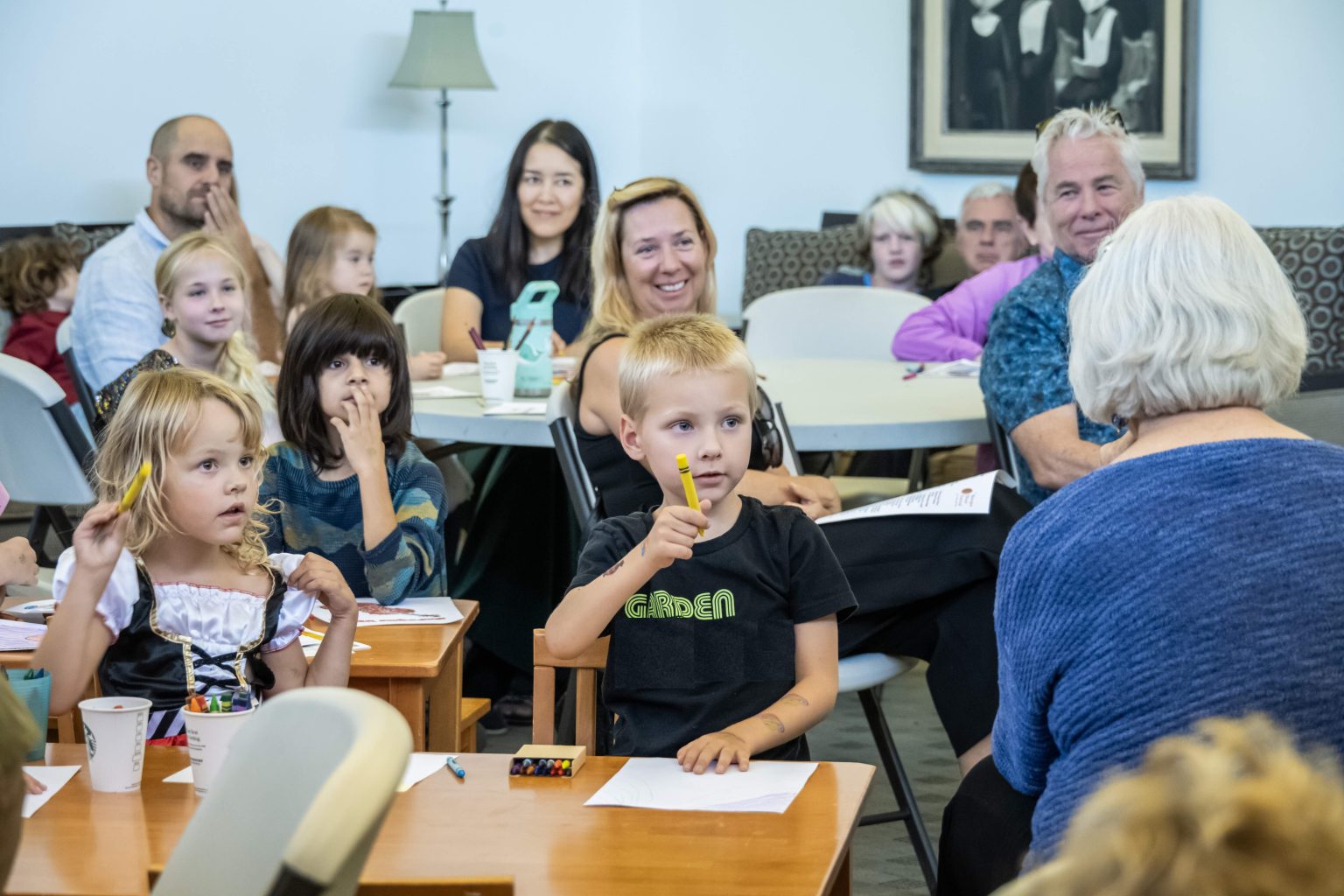 Gallery 3 - kid's coloring while listening to baroque trio sonatas with parents and grandparents looking on.
